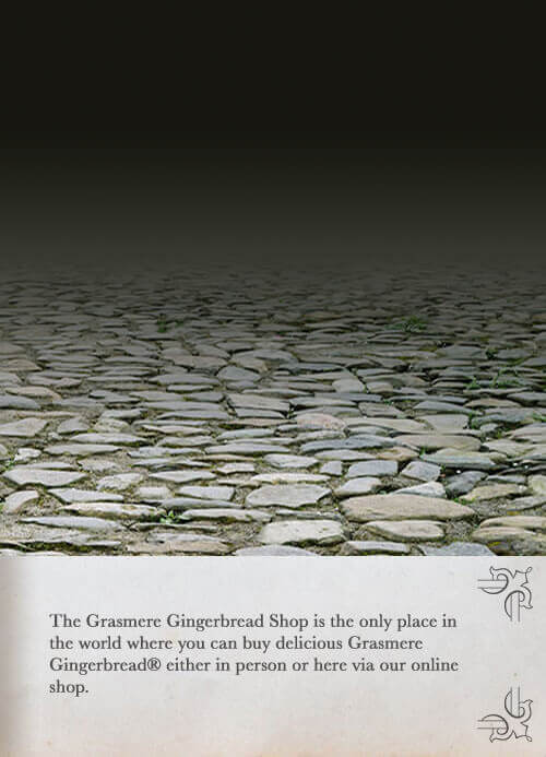 The interior counter of the Grasmere Gingerbread Shop, period-costume staff serving fresh gingerbread